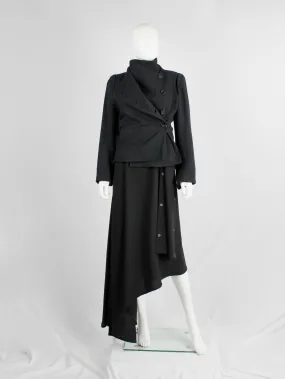 Ann Demeulemeester black coat with standing neckline and asymmetric button closure — fall 2010