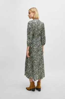 Long-sleeved dress in printed canvas with buttoned placket