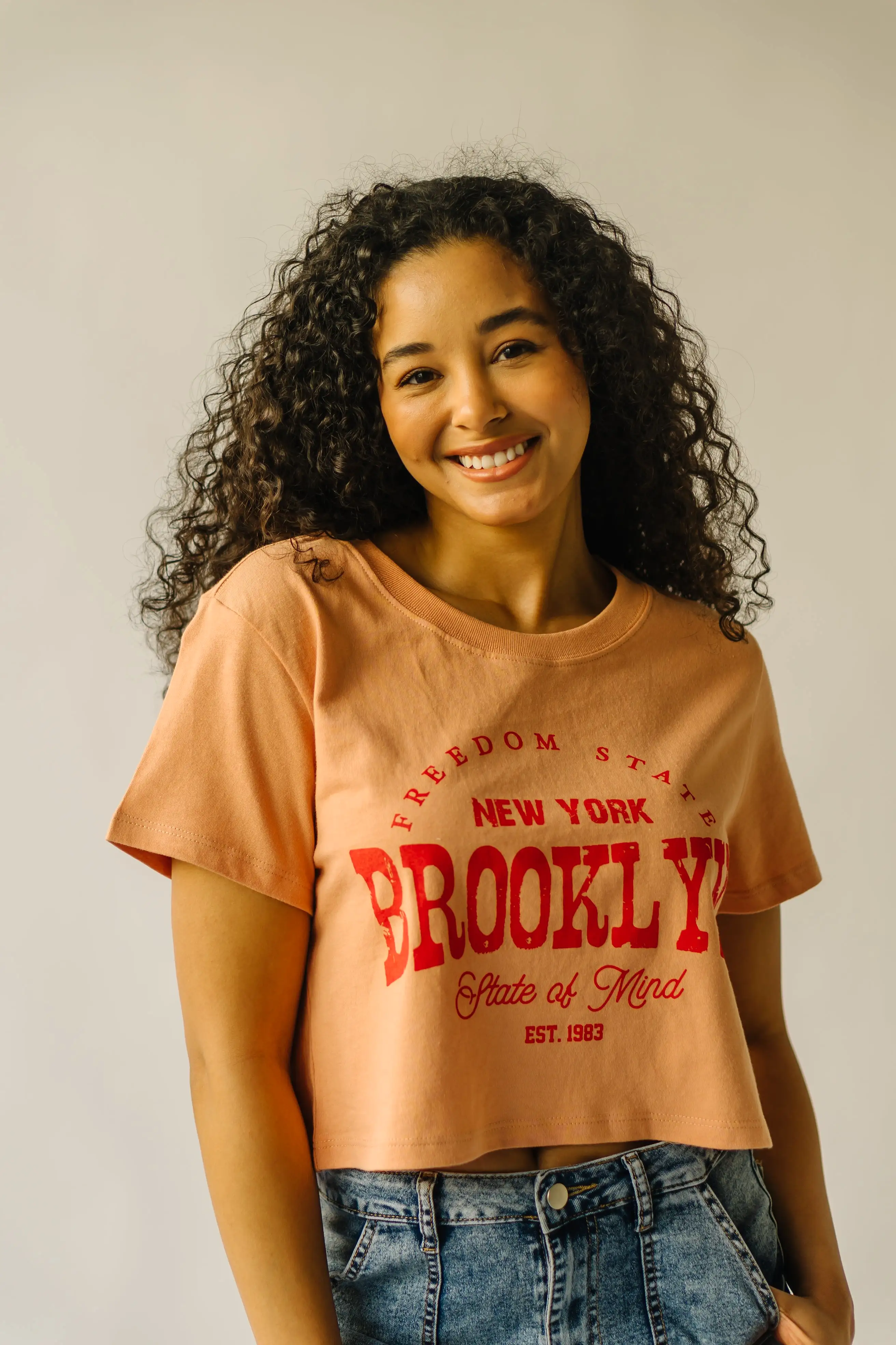 The NYC Freedom State Graphic Tee in Tan